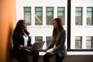 Business women having a discussion on Family Business Consulting